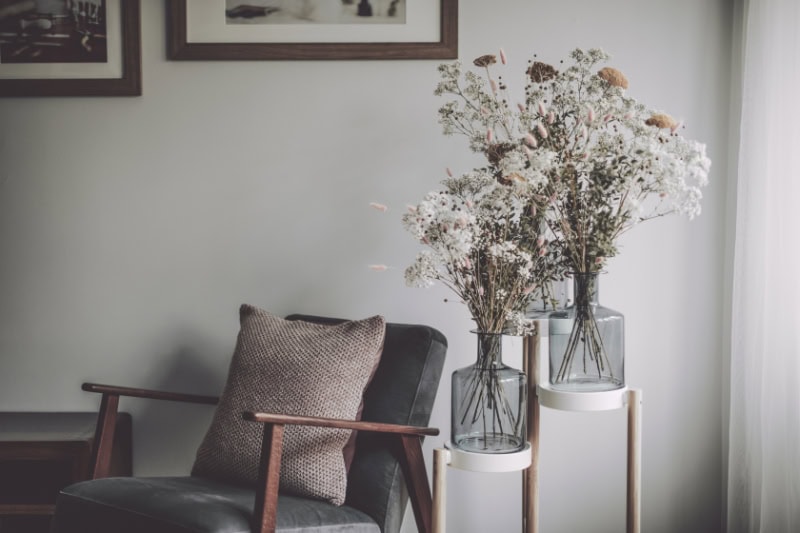 How an Air Handler Works. Flower arrangement on an end table in the living room.